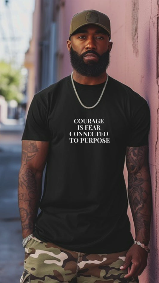 Black man wearing a black tshirt with self expression statement
